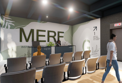 Doctor giving a hearing implant presentation to a group of trainees.